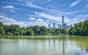 Preview wallpaper pond, buildings, trees, sky, nature, city