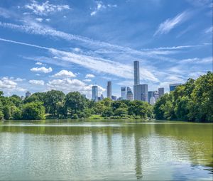 Preview wallpaper pond, buildings, trees, sky, nature, city