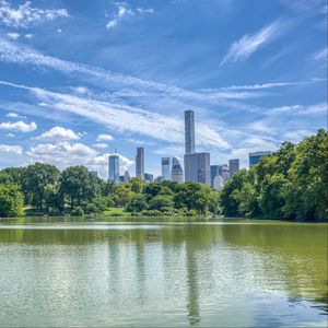 Preview wallpaper pond, buildings, trees, sky, nature, city