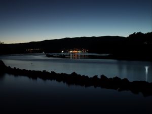 Preview wallpaper pond, lights, reflection, mountain, silhouette, dark