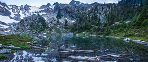 Preview wallpaper pond, logs, stones, mountains, trees