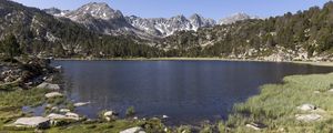 Preview wallpaper pond, mountains, grass, stones, landscape, nature