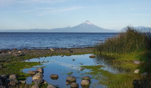 Preview wallpaper pond, stones, sea, volcano, nature