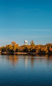 Preview wallpaper pond, trees, tower, sky