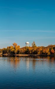 Preview wallpaper pond, trees, tower, sky