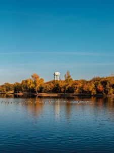 Preview wallpaper pond, trees, tower, sky