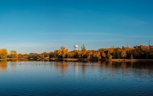 Preview wallpaper pond, trees, tower, sky