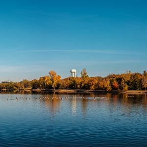 Preview wallpaper pond, trees, tower, sky