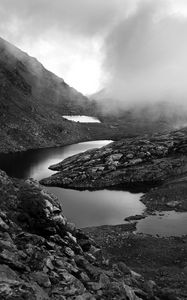 Preview wallpaper ponds, fog, mountains, stones, black and white