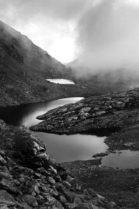 Preview wallpaper ponds, fog, mountains, stones, black and white