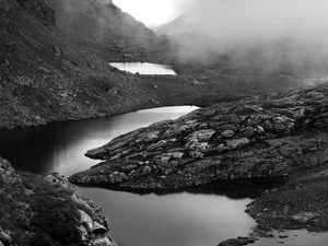 Preview wallpaper ponds, fog, mountains, stones, black and white