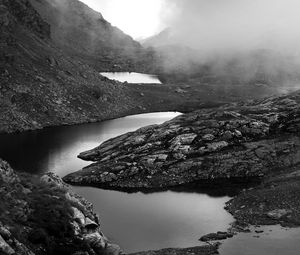 Preview wallpaper ponds, fog, mountains, stones, black and white