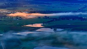 Preview wallpaper ponds, valley, mountains, clouds, sunrise, aerial view