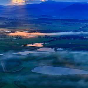 Preview wallpaper ponds, valley, mountains, clouds, sunrise, aerial view