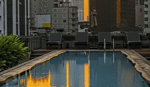 Preview wallpaper pool, buildings, city, sunrise