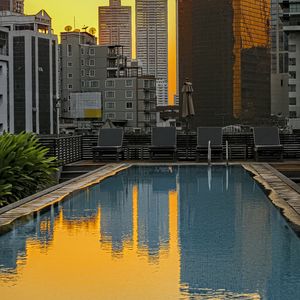 Preview wallpaper pool, buildings, city, sunrise