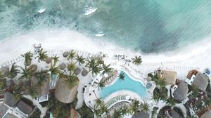 Preview wallpaper pool, coast, palm trees, aerial view