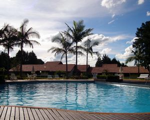 Preview wallpaper pool, lodges, rest, palm trees, sky