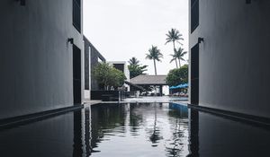 Preview wallpaper pool, water, buildings, palm trees, tropics