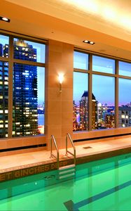 Preview wallpaper pool, water, city, interior, windows, hotel, light