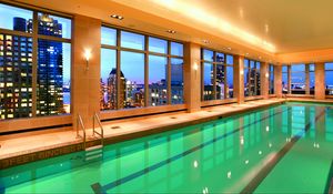 Preview wallpaper pool, water, city, interior, windows, hotel, light