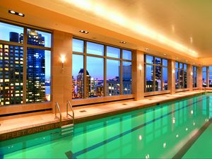 Preview wallpaper pool, water, city, interior, windows, hotel, light