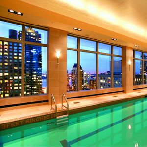 Preview wallpaper pool, water, city, interior, windows, hotel, light