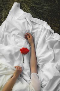 Preview wallpaper poppy, hands, flower, cloth, handsomely