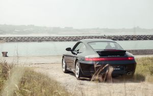 Preview wallpaper porsche 911 carrera 4s, porsche, car, sportscar, black, rear view, promenade