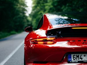 Preview wallpaper porsche 911, porsche, car, sportscar, red, rear view, road