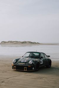 Preview wallpaper porsche 911, porsche, car, sportscar, black, beach