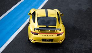 Preview wallpaper porsche 911, porsche, car, yellow, track