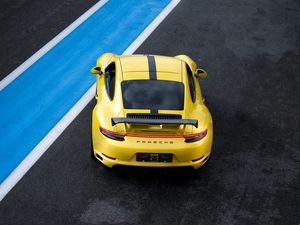 Preview wallpaper porsche 911, porsche, car, yellow, track