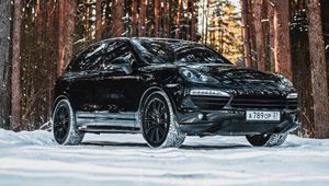 Preview wallpaper porsche, car, black, side view, forest, snow