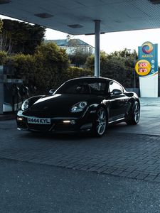 Preview wallpaper porsche, car, black, gas station