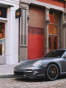 Preview wallpaper porsche, car, gray, parking, street