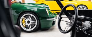 Preview wallpaper porsche, car, green, steering wheel, salon