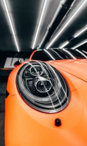 Preview wallpaper porsche, car, orange, headlight, front view