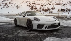 Preview wallpaper porsche, car, sports car, white, snow, mountains