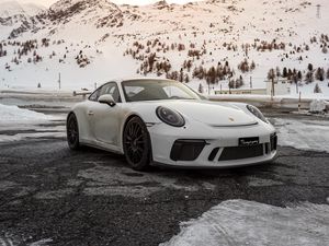 Preview wallpaper porsche, car, sports car, white, snow, mountains