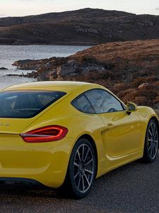 Preview wallpaper porsche, cayman s, yellow, rear view