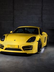 Preview wallpaper porsche, cayman, yellow, front view