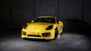 Preview wallpaper porsche, cayman, yellow, front view