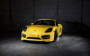 Preview wallpaper porsche, cayman, yellow, front view