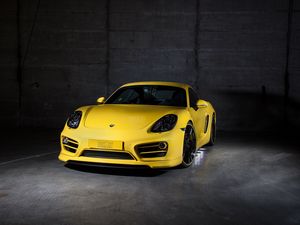 Preview wallpaper porsche, cayman, yellow, front view