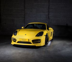 Preview wallpaper porsche, cayman, yellow, front view