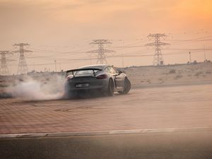 Preview wallpaper porsche gt4, porsche, car, gray, drift, smoke, track