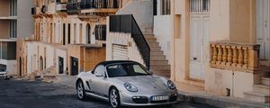 Preview wallpaper porsche, sports car, building, facade, street, marsalforn, malta