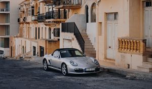 Preview wallpaper porsche, sports car, building, facade, street, marsalforn, malta