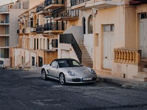 Preview wallpaper porsche, sports car, building, facade, street, marsalforn, malta